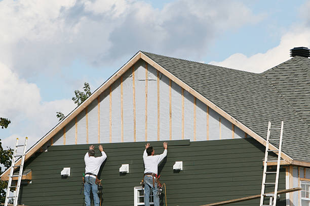 Professional Siding Contractor technician working in Lafayette, CO
